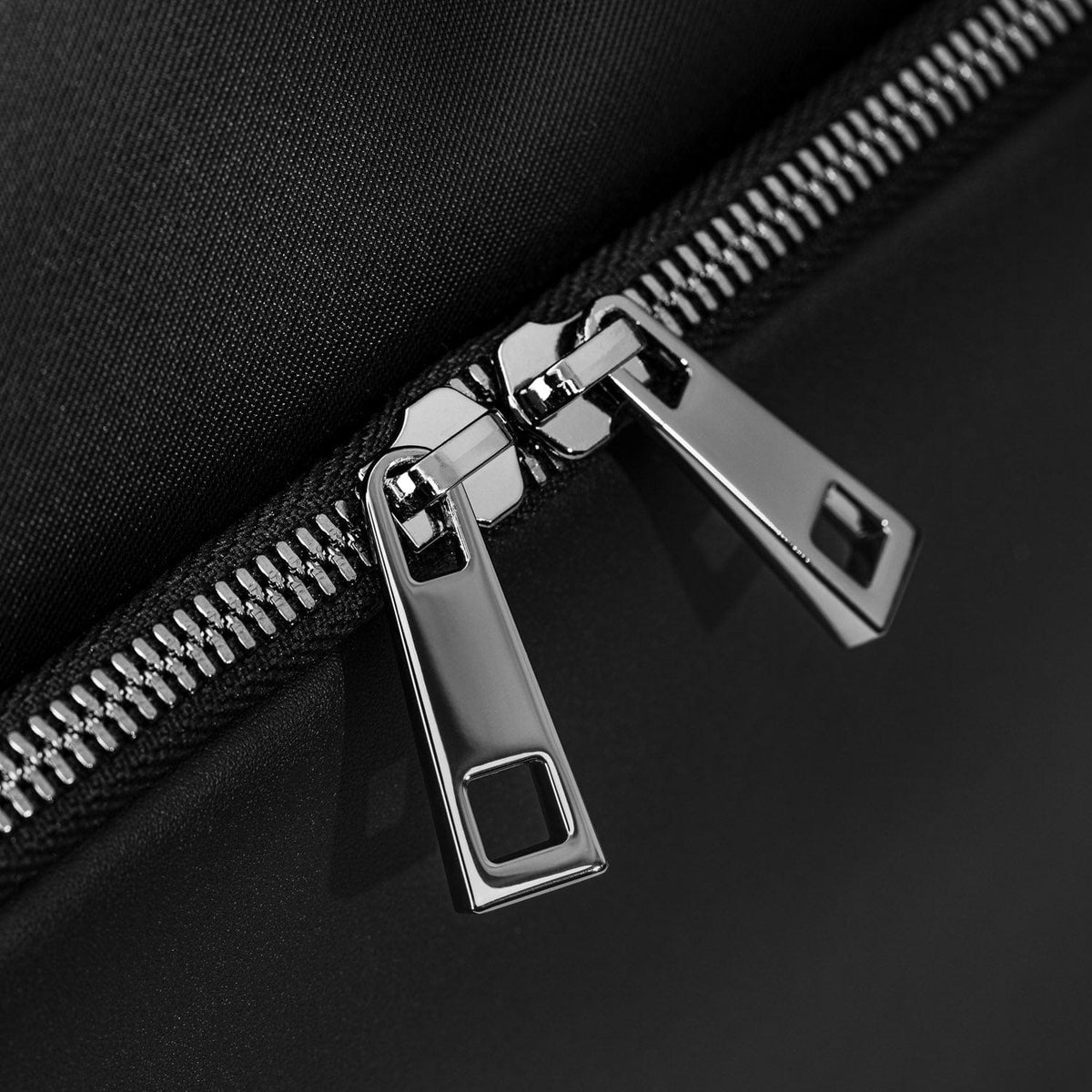 Close-up of the Kennedy's leather handles and zips